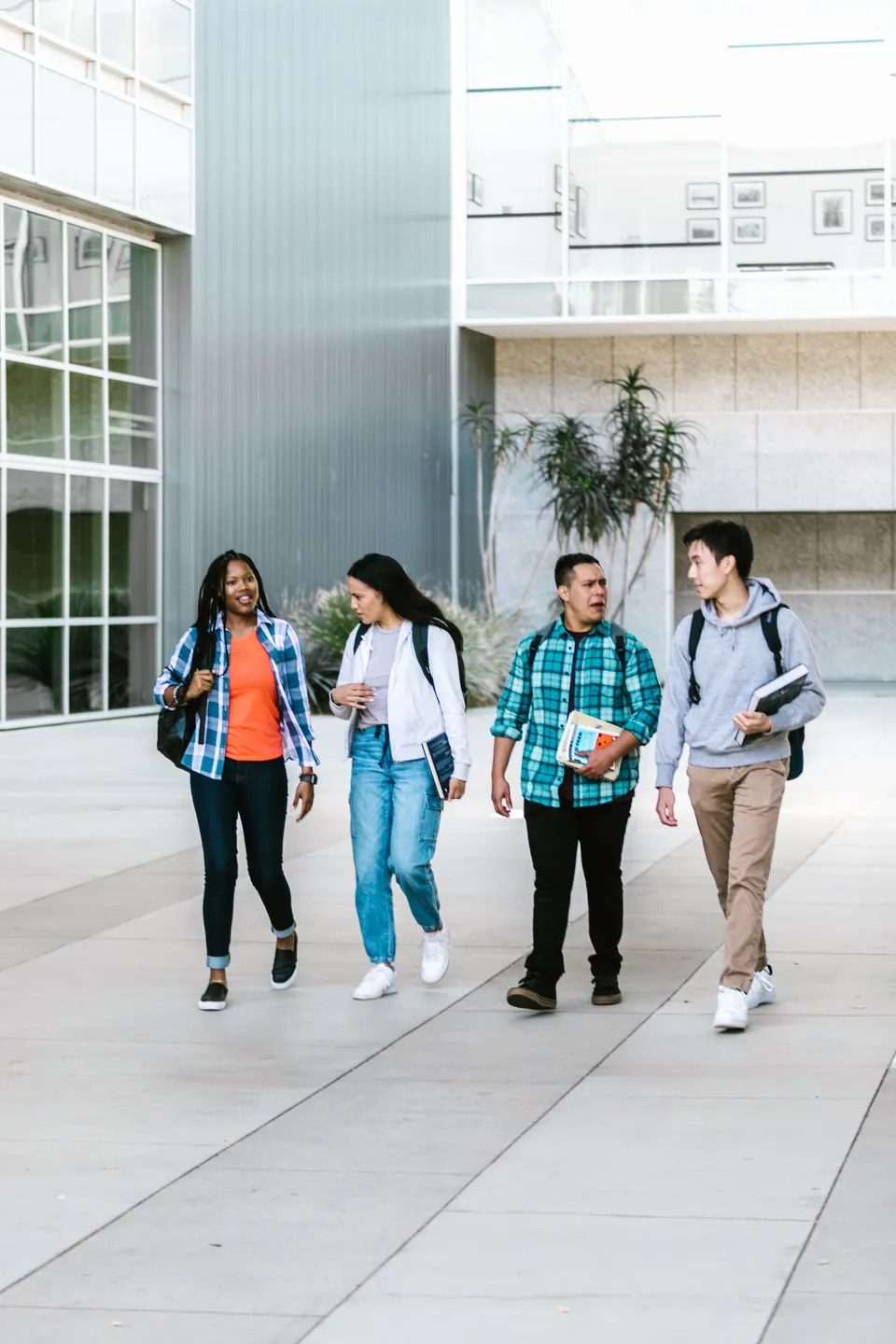 A group of college students walking together on campus
