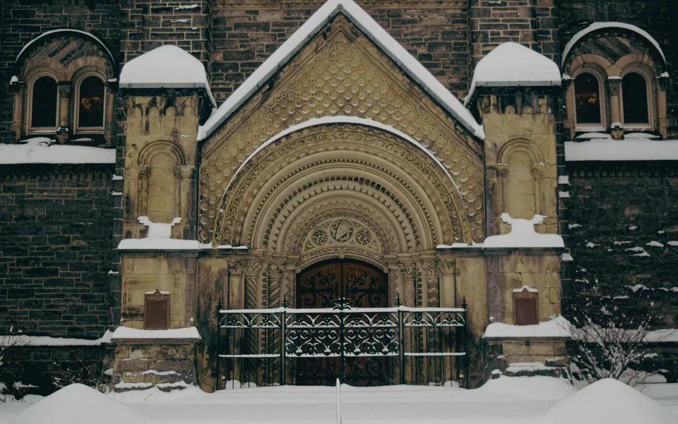 Snow-covered Gothic facade at the University of Toronto